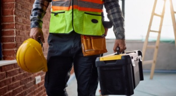construction worker heading to work at a construction site